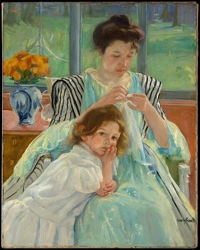Jeune m&egrave;re cousant